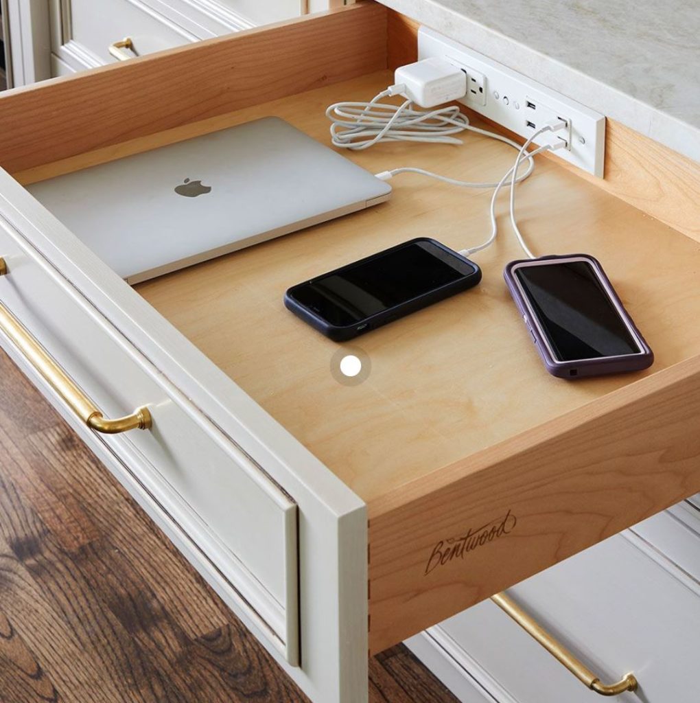 Charging station for devices in drawer.  Details like this keep you organized and encourage good habits like keeping devices out of the bedroom.