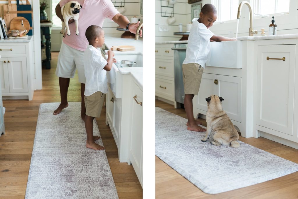 A beautiful antifatigue mat in the kitchen reduces leg and back strain.  One example of a simple fix to create a healthier home that helps you thrive.