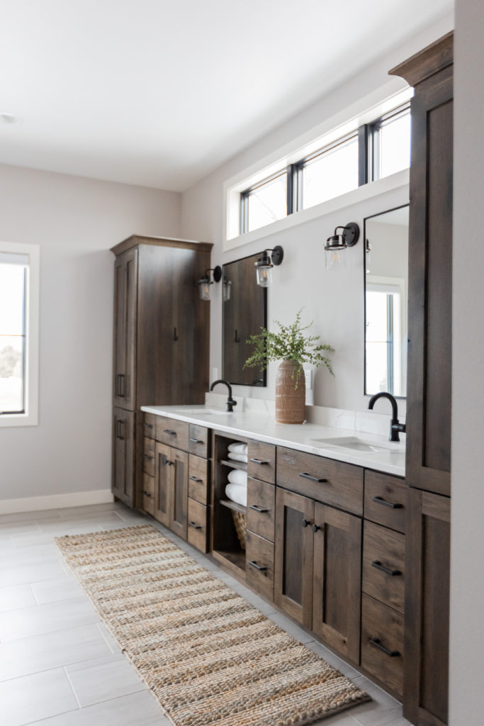 Warm cabinetry in the Master Bathroom