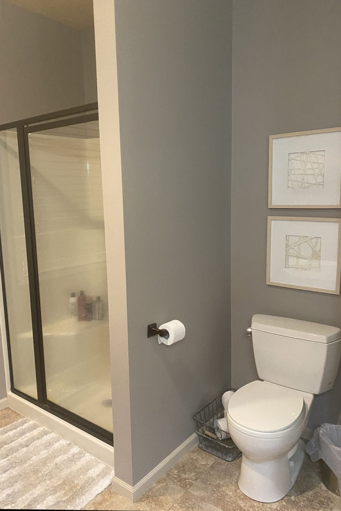 Existing acrylic shower insert is very builder-grade