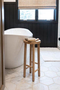 Freestanding Tub with Black Wainscotting