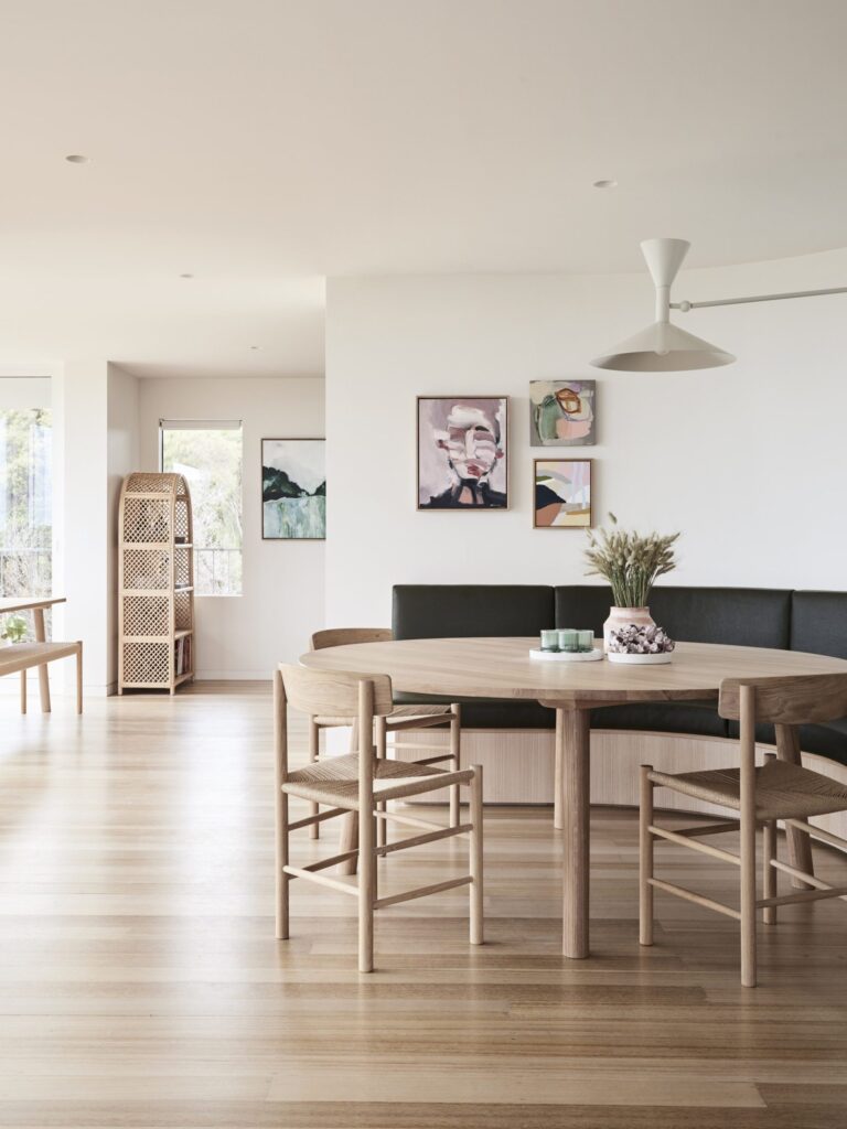 Modern Dining Space with Booth seating and light wood furniture and floors